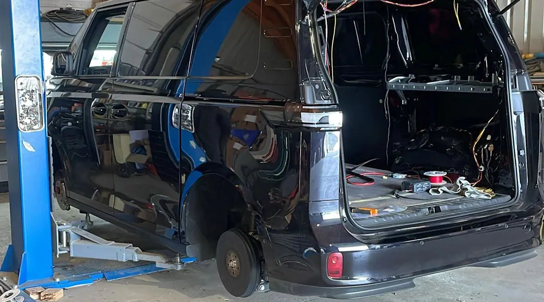 VW ID. Buzz on the lift during a conversion