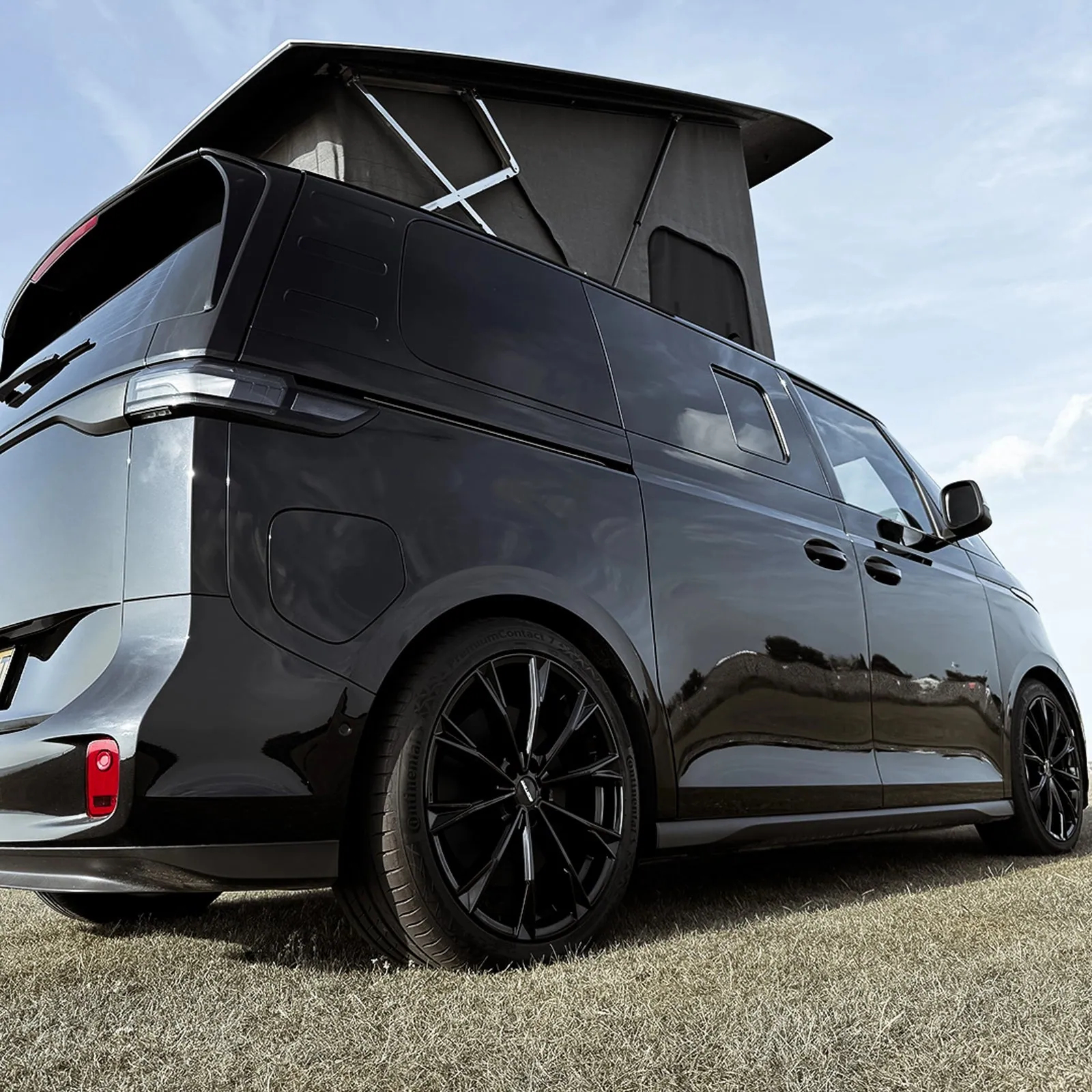 VW ID. Buzz camper conversion with the roof raised